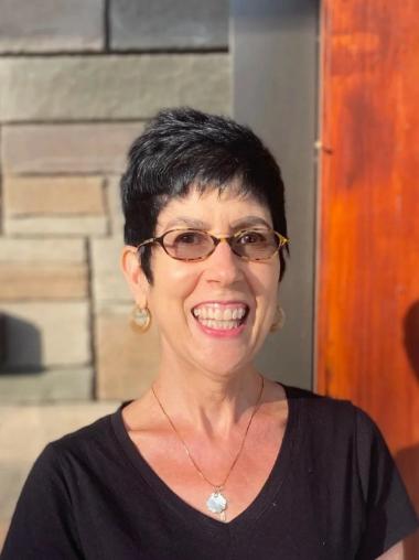 Ms. Caroline Pomakis